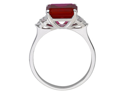 14 Karat Weißgold Ring mit 6 runden Diamanten und 1 oktagonem Rubin – 2,65 Gramm