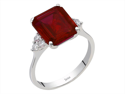 14 Karat Weißgold Ring mit 6 runden Diamanten und 1 oktagonem Rubin – 2,65 Gramm