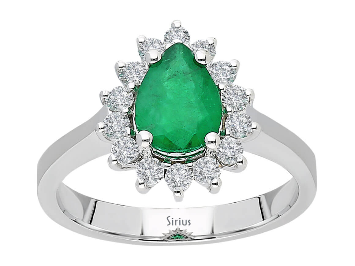 Eleganter Ring mit 14 rund geschliffenen Diamanten und einem tropfenförmigen Saphir in 14 Karat Weißgold