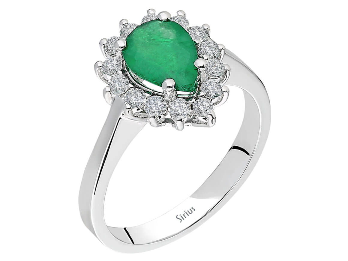 Eleganter Ring mit 14 rund geschliffenen Diamanten und einem tropfenförmigen Saphir in 14 Karat Weißgold
