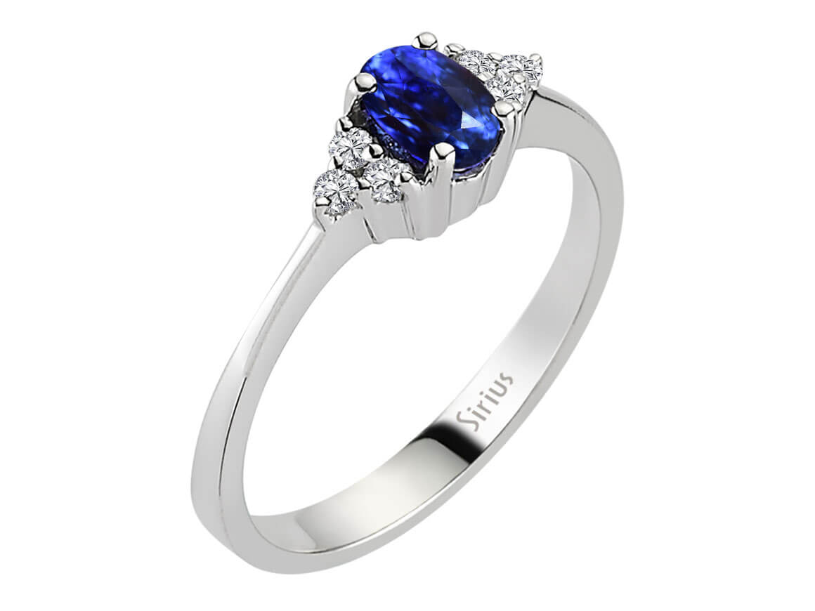 Feiner Diamant- und Saphirring mit 6 Rundschliff-Diamanten und 1 Ovalem Saphir in 8 Karat Weißgold
