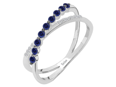 Orbit ring with sapphires and diamonds made of 14K gold