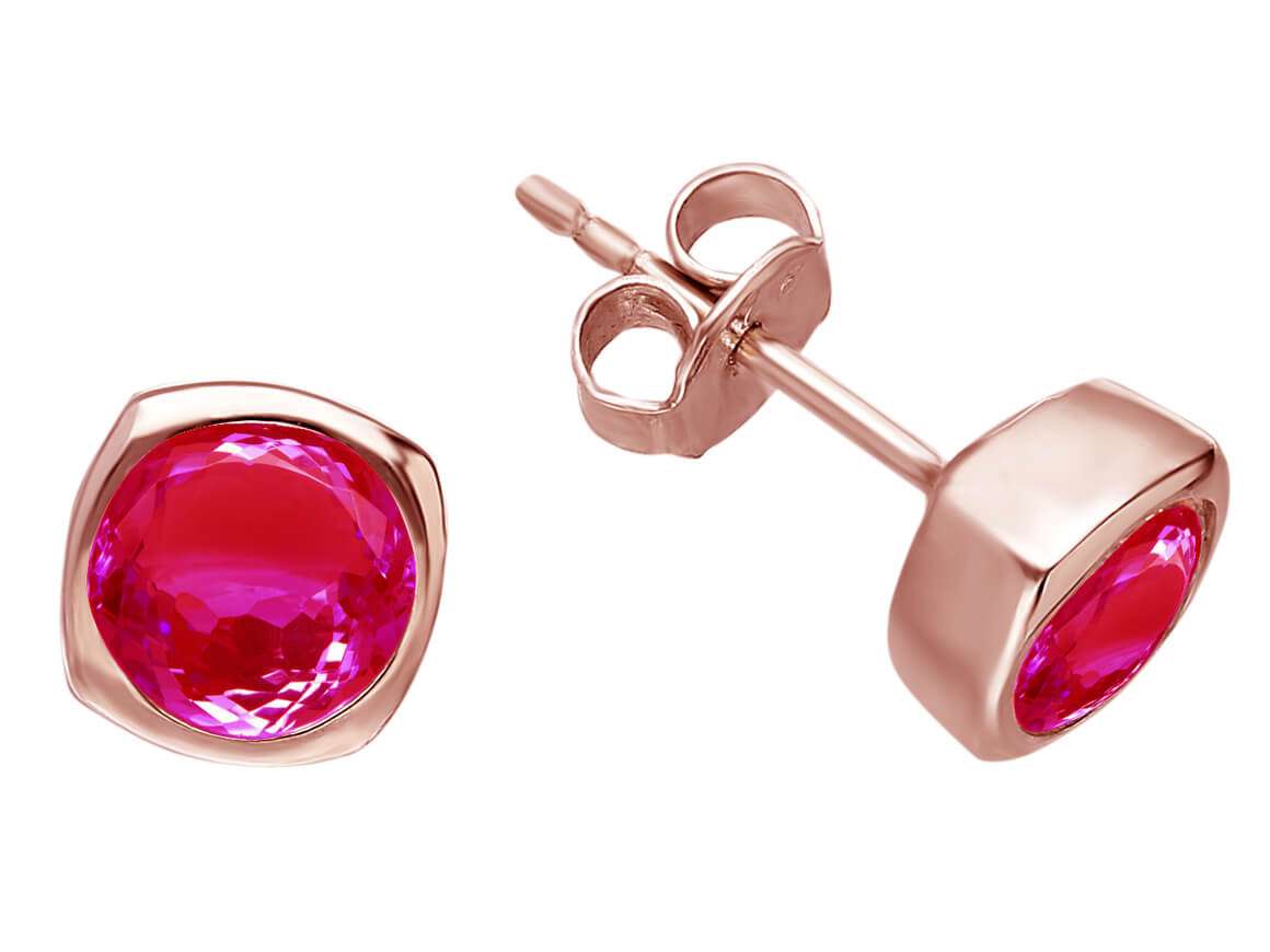 Clous d'oreilles solitaires avec rubis en or rose 585