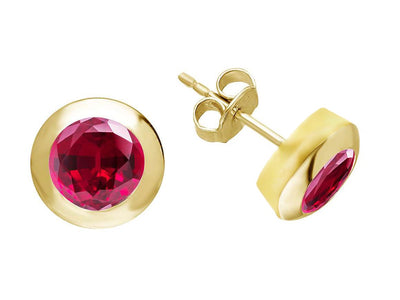 Clous d'oreilles solitaires avec rubis en or jaune 585
