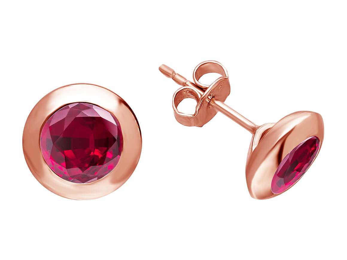 Clous d'oreilles solitaires avec rubis en or rose 585